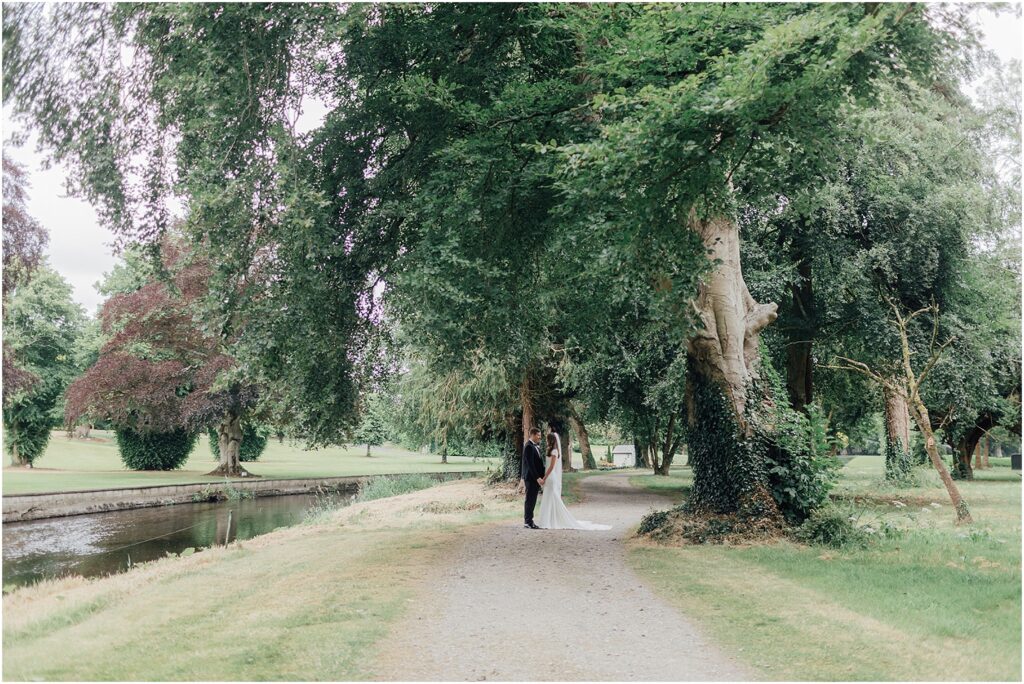 wedding-couple-photos-on-grounds-of-k-club-rainy-day